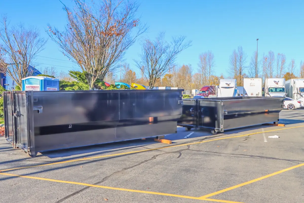 Professional dumpster rental service with roll-off container on residential driveway in Norridge